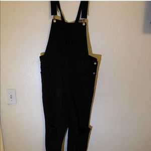 These all black pair of overalls